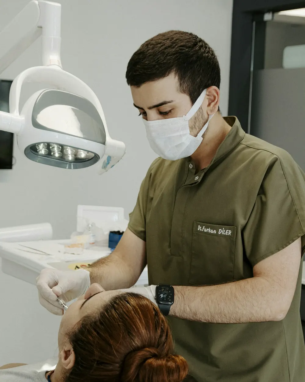 A dentist treating a patient