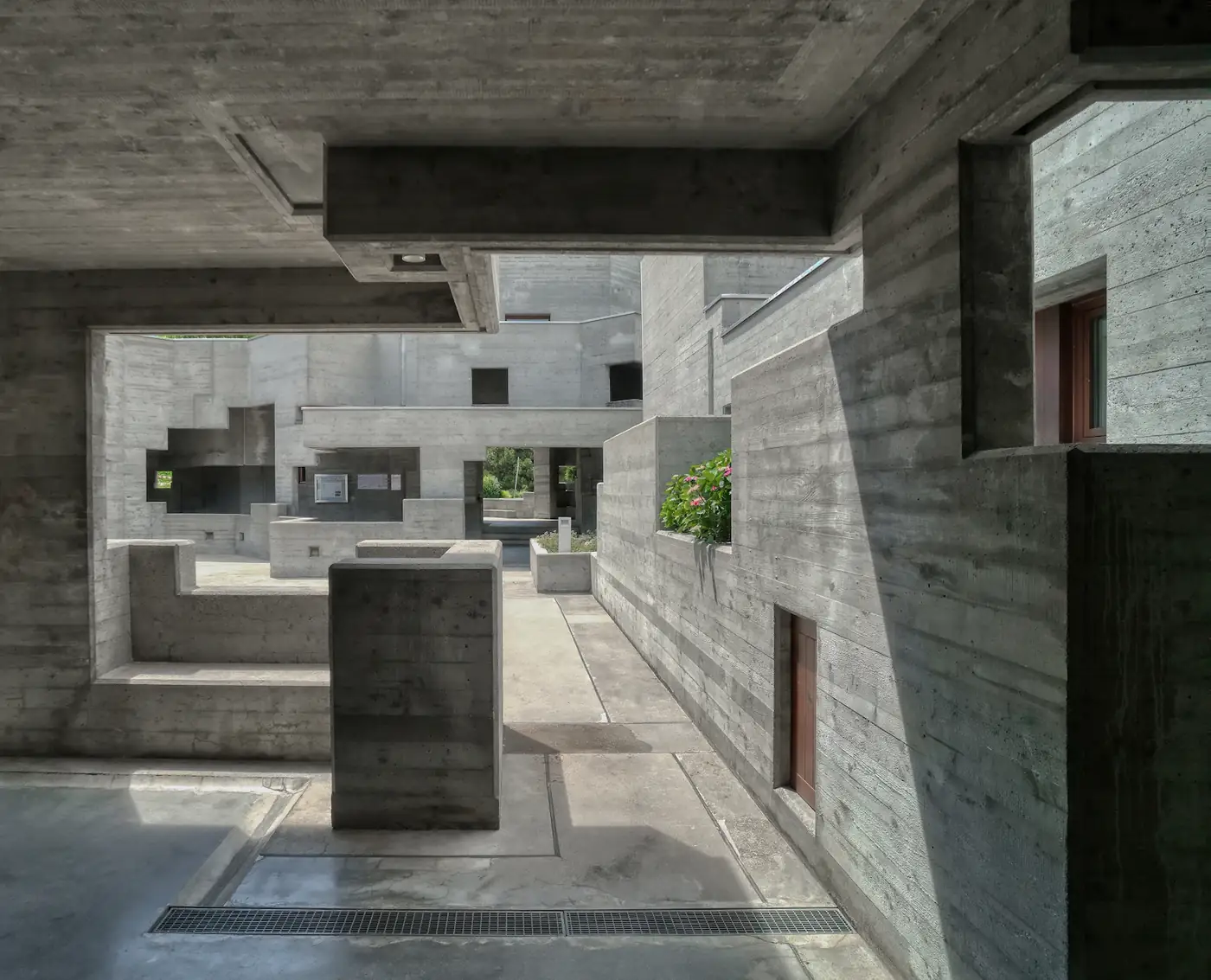 Brutalist courtyard with stacked concrete blocks