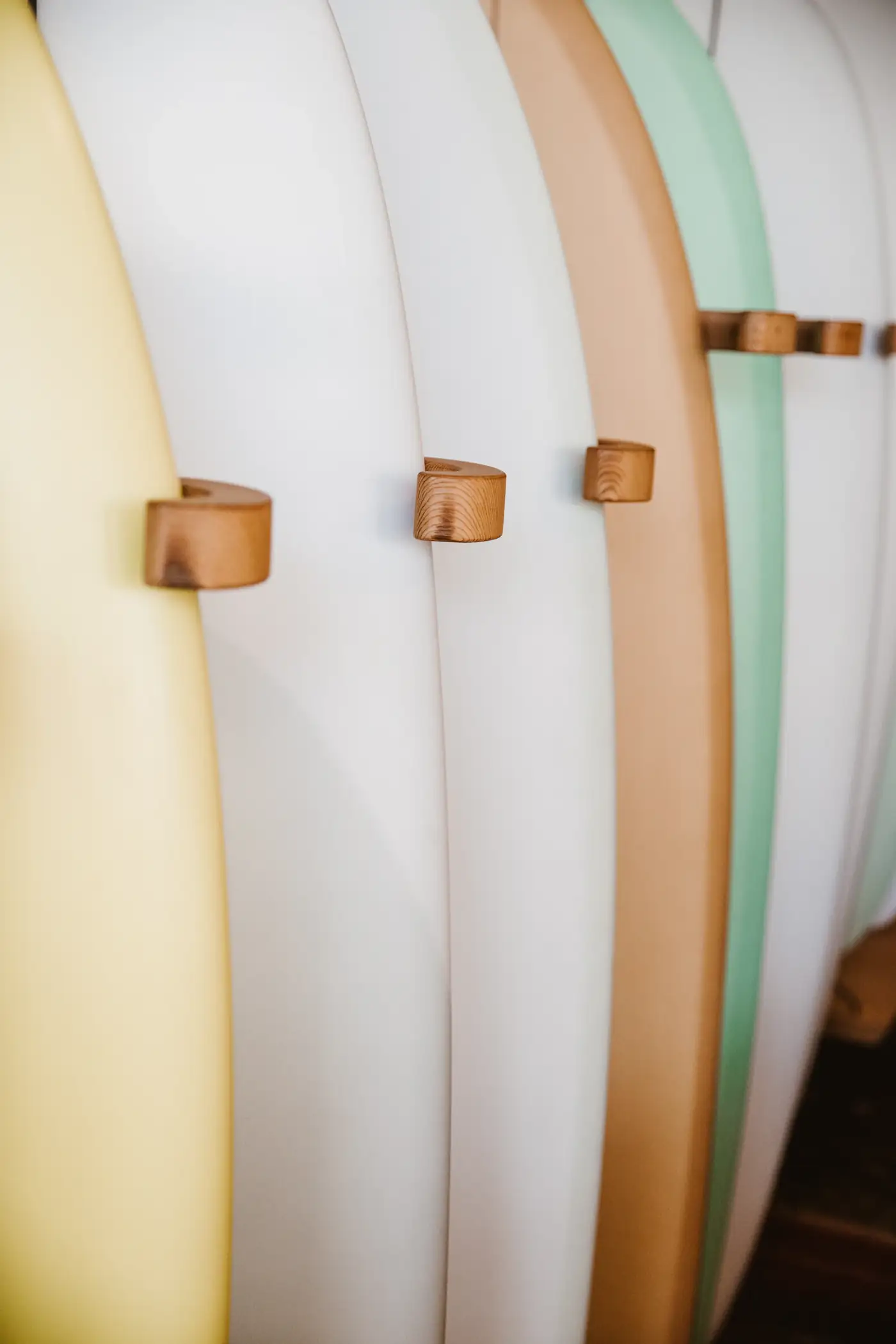 White and wooden boards on a wall rack