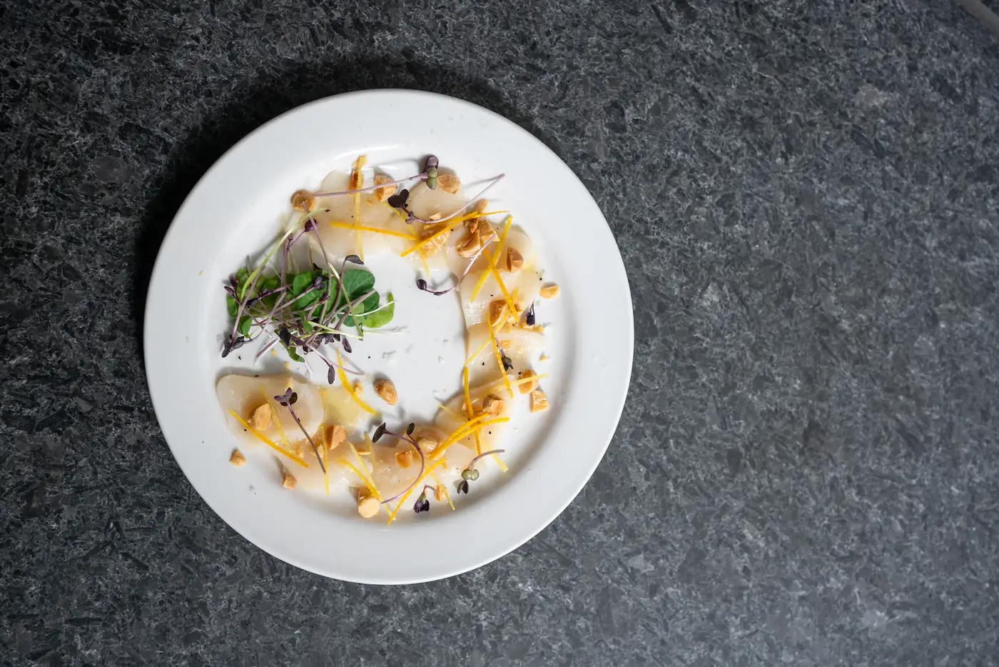 A ring of food on a white plate