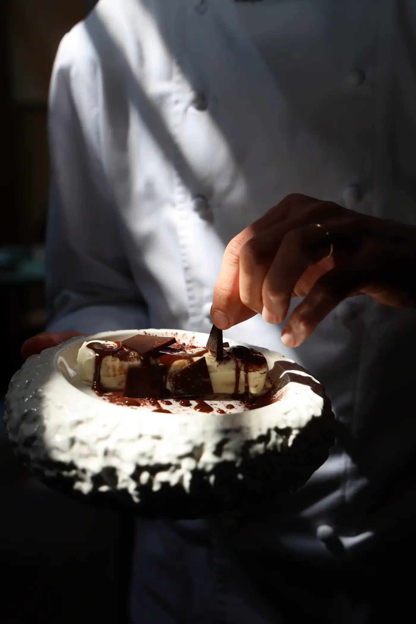 Dessert being finished with a spoon